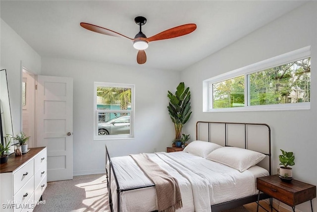 1478 Cordova Ave, Fort Myers, FL 33901 - bedroom featuring multiple windows, light carpet, and ceiling fan