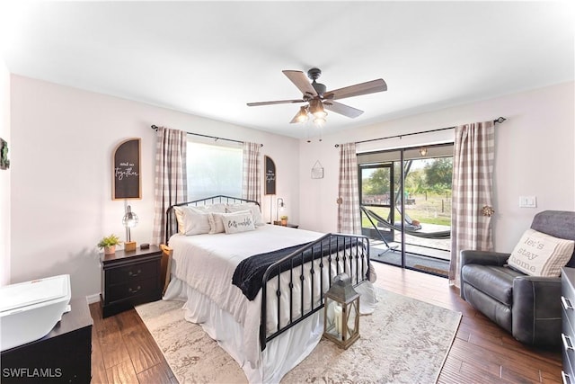 bedroom featuring access to outside, ceiling fan, and hardwood / wood-style flooring