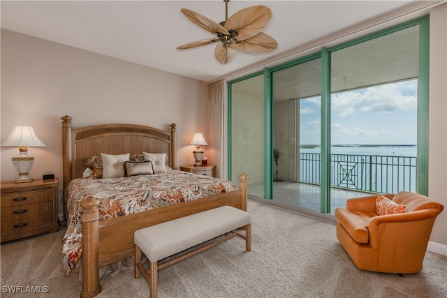 1079 Bald Eagle Dr Unit N703, Marco Island, FL 34145 - bedroom with a water view, carpet, expansive windows, and access to outside