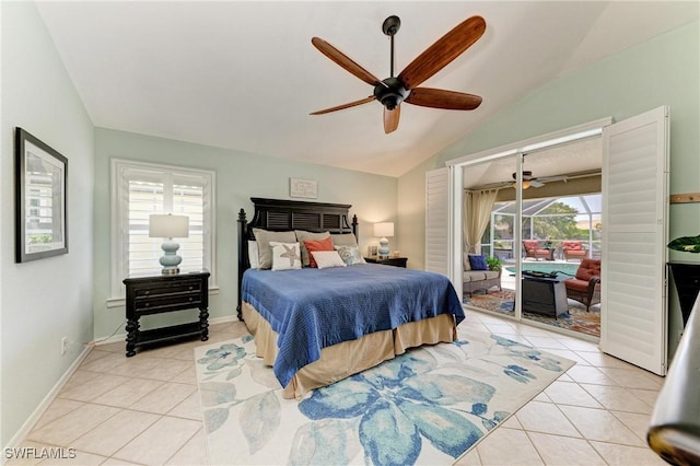 5010 La Costa Island Ct, Punta Gorda, FL 33950 - bedroom with vaulted ceiling, light tile patterned floors, access to exterior, a ceiling fan, and baseboards