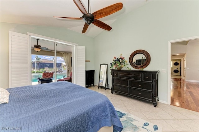 5010 La Costa Island Ct, Punta Gorda, FL 33950 - bedroom featuring lofted ceiling, access to outside, tile patterned floors, baseboards, and a ceiling fan
