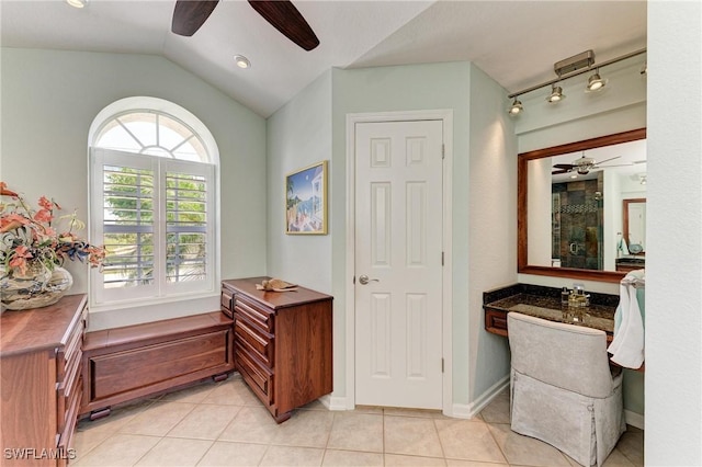 5010 La Costa Island Ct, Punta Gorda, FL 33950 - full bath featuring ceiling fan, vaulted ceiling, vanity, and tile patterned flooring
