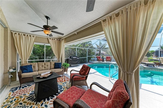 5010 La Costa Island Ct, Punta Gorda, FL 33950 - exterior space with a ceiling fan, an outdoor hangout area, a patio area, and glass enclosure
