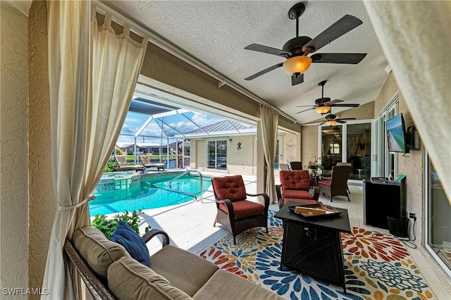 5010 La Costa Island Ct, Punta Gorda, FL 33950 - view of patio / terrace with outdoor lounge area, ceiling fan, glass enclosure, and a pool with connected hot tub