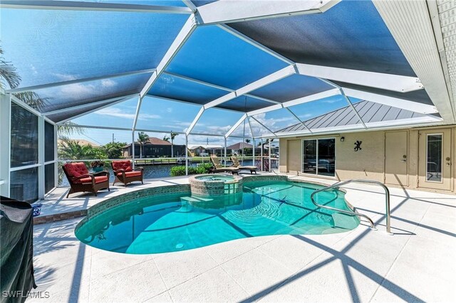 5010 La Costa Island Ct, Punta Gorda, FL 33950 - view of pool with a patio area, a pool with connected hot tub, and glass enclosure