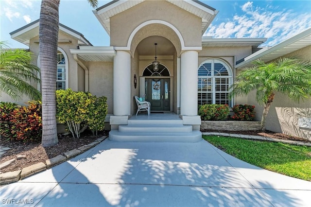 5010 La Costa Island Ct, Punta Gorda, FL 33950 - entrance to property featuring stucco siding