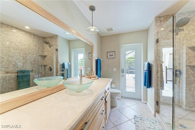 5010 La Costa Island Ct, Punta Gorda, FL 33950 - full bath with a shower stall, healthy amount of natural light, and toilet