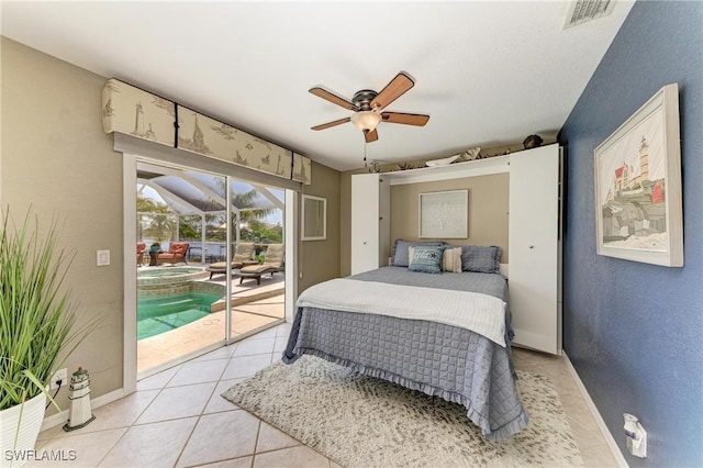 5010 La Costa Island Ct, Punta Gorda, FL 33950 - bedroom featuring access to outside, light tile patterned floors, baseboards, and ceiling fan