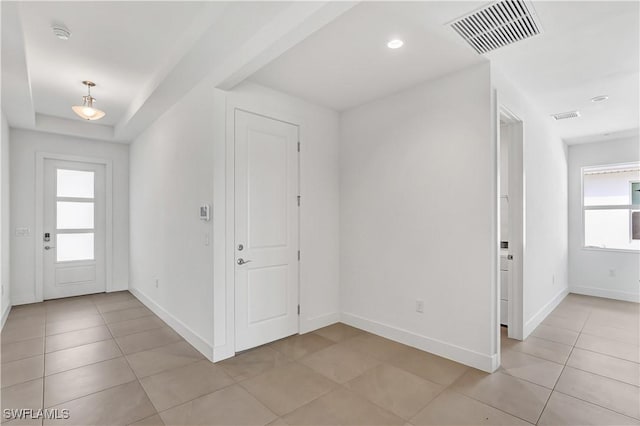 44494 Little Blue Heron Way, Punta Gorda, FL 33982 - entrance foyer with plenty of natural light, baseboards, light tile patterned floors, and recessed lighting