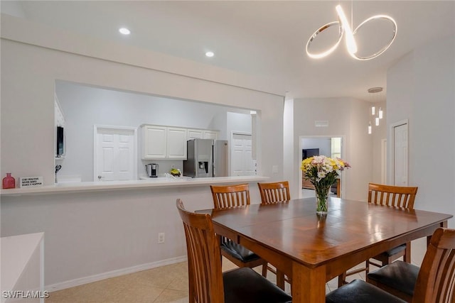 8546 Silk Oak Ln, Naples, FL 34119 - dining space featuring a chandelier, recessed lighting, baseboards, and light tile patterned floors