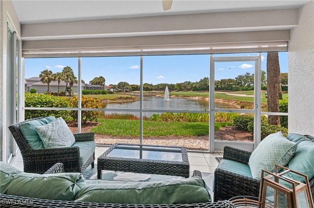 sunroom / solarium featuring an outdoor hangout area, a water view, and plenty of natural light
