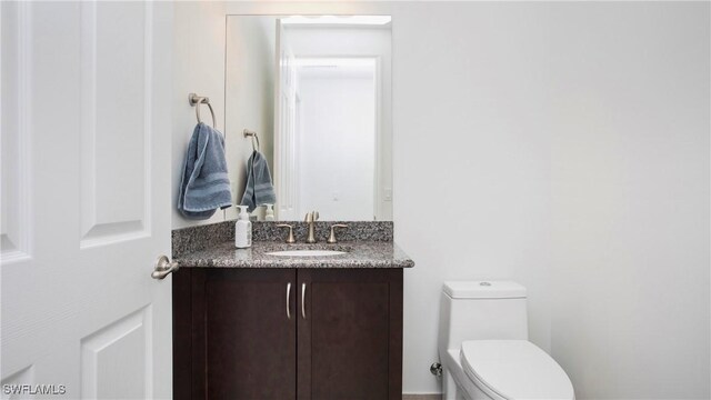 2954 Cinnamon Bay Cir, Naples, FL 34119 - bathroom with vanity and toilet