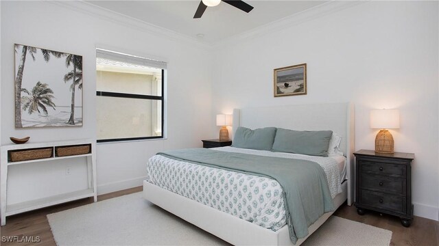 2954 Cinnamon Bay Cir, Naples, FL 34119 - bedroom featuring wood finished floors, ornamental molding, baseboards, and a ceiling fan