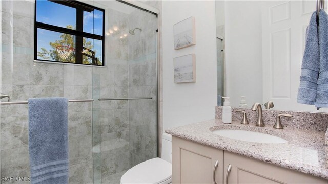 2954 Cinnamon Bay Cir, Naples, FL 34119 - full bath with vanity, a stall shower, and toilet