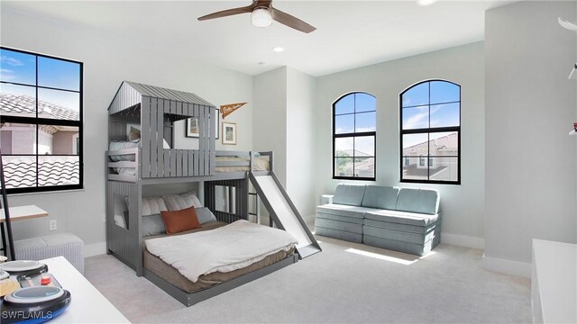 2954 Cinnamon Bay Cir, Naples, FL 34119 - carpeted bedroom with multiple windows, baseboards, recessed lighting, and ceiling fan
