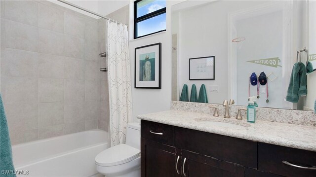 2954 Cinnamon Bay Cir, Naples, FL 34119 - bathroom featuring vanity, shower / bathtub combination with curtain, and toilet