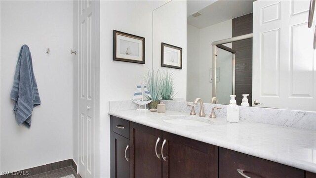 2954 Cinnamon Bay Cir, Naples, FL 34119 - full bathroom featuring vanity, tile patterned floors, and baseboards