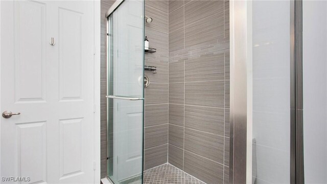 2954 Cinnamon Bay Cir, Naples, FL 34119 - bathroom with a shower stall
