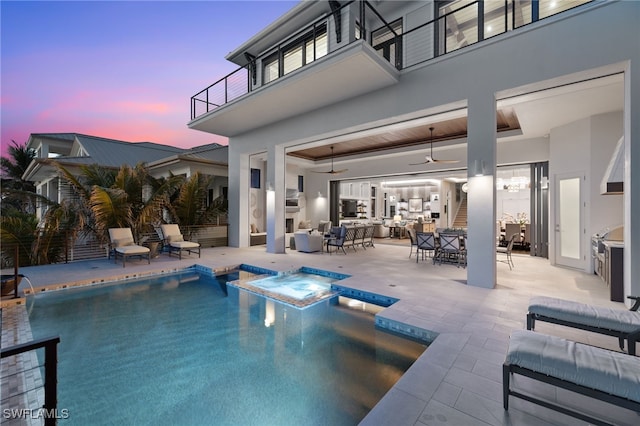 26924 Hickory Blvd, Bonita Springs, FL 34134 - view of swimming pool featuring a patio, ceiling fan, a pool with connected hot tub, outdoor lounge area, and outdoor dining area