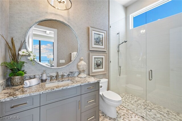 26924 Hickory Blvd, Bonita Springs, FL 34134 - full bath featuring toilet, a stall shower, and vanity