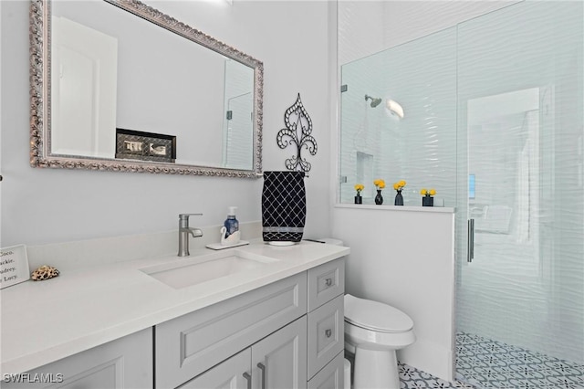 388 Pine Ave, Naples, FL 34108 - bathroom featuring vanity, a shower stall, and toilet