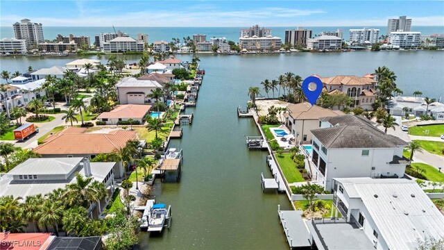 388 Pine Ave, Naples, FL 34108 - aerial perspective of suburban area featuring a large body of water