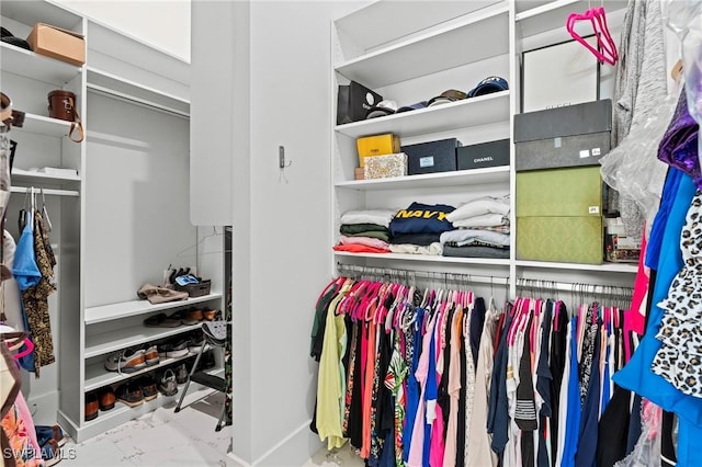 388 Pine Ave, Naples, FL 34108 - spacious closet featuring marble finish floors