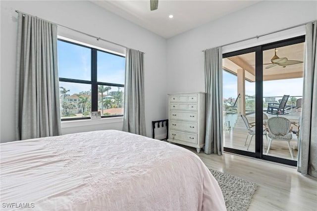 388 Pine Ave, Naples, FL 34108 - bedroom with access to outside, multiple windows, wood finished floors, recessed lighting, and a ceiling fan