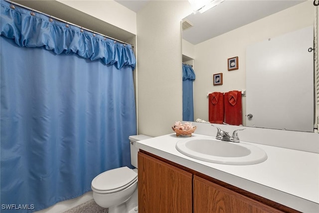 6861 Bogey Dr, Fort Myers, FL 33919 - bathroom featuring toilet, vanity, and a shower with shower curtain