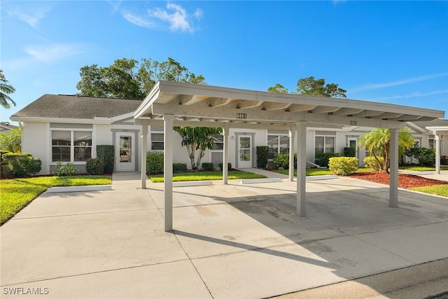 6861 Bogey Dr, Fort Myers, FL 33919 - view of home's community featuring covered parking