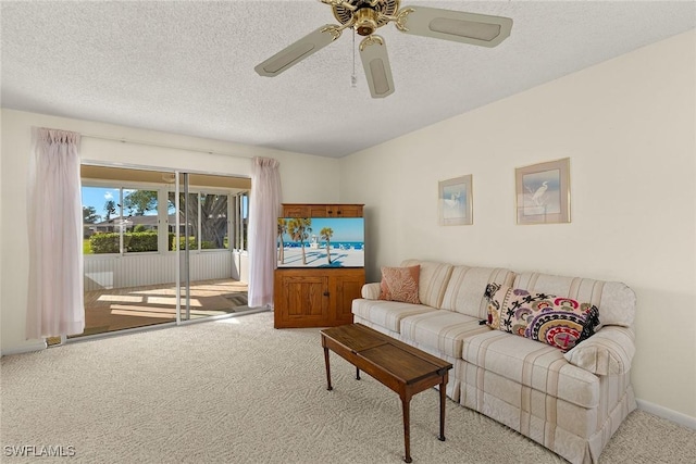 6861 Bogey Dr, Fort Myers, FL 33919 - carpeted living area featuring a textured ceiling and ceiling fan