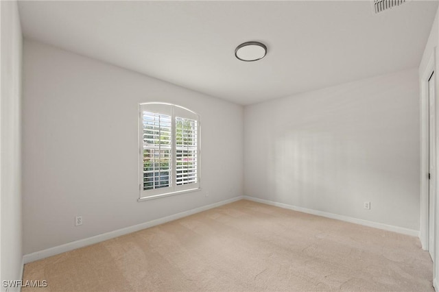 1526 Vintage Ln, Naples, FL 34104 - empty room with light colored carpet and baseboards