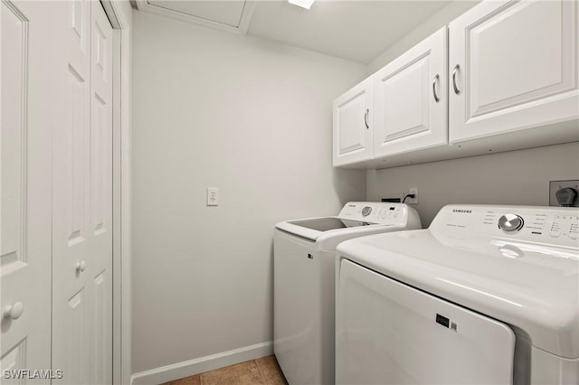 1526 Vintage Ln, Naples, FL 34104 - washroom featuring cabinet space, washer and dryer, and baseboards