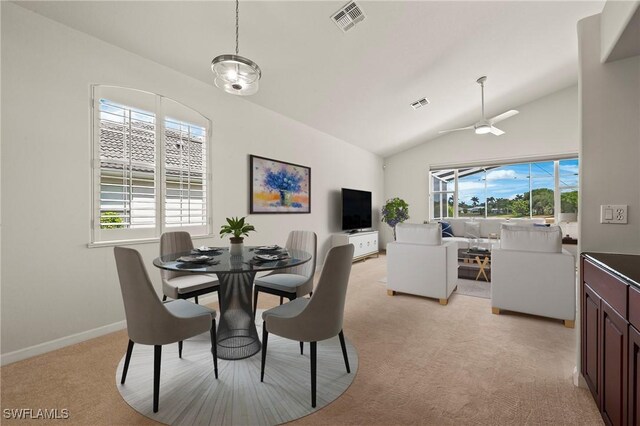 1526 Vintage Ln, Naples, FL 34104 - dining area with light carpet, lofted ceiling, ceiling fan, and baseboards