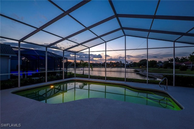 1526 Vintage Ln, Naples, FL 34104 - outdoor pool featuring a water view, a patio area, and glass enclosure