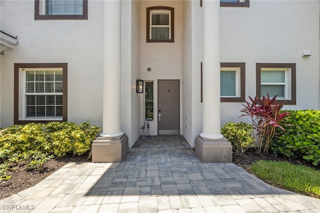 9380 Triana Ter Unit 312, Fort Myers, FL 33912 - property entrance featuring stucco siding