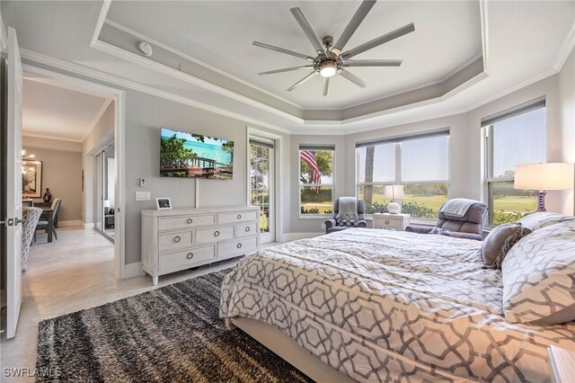 9380 Triana Ter Unit 312, Fort Myers, FL 33912 - bedroom featuring a raised ceiling, crown molding, baseboards, and ceiling fan