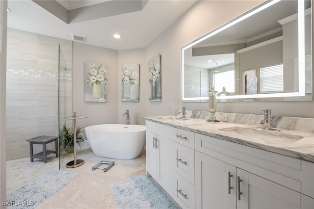 9380 Triana Ter Unit 312, Fort Myers, FL 33912 - bathroom with walk in shower, crown molding, double vanity, a soaking tub, and recessed lighting