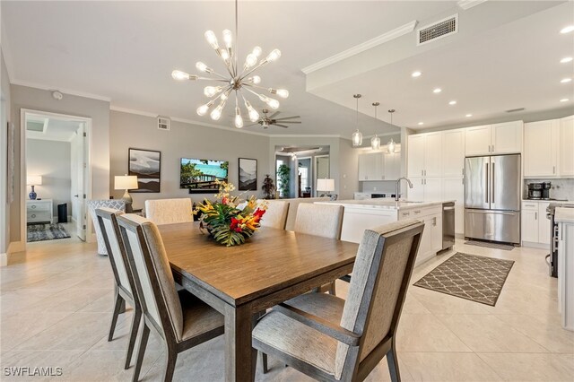 9380 Triana Ter Unit 312, Fort Myers, FL 33912 - dining room featuring a chandelier, crown molding, light tile patterned floors, and recessed lighting