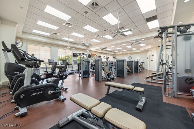 9380 Triana Ter Unit 312, Fort Myers, FL 33912 - workout area featuring a paneled ceiling and ceiling fan