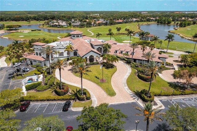 9380 Triana Ter Unit 312, Fort Myers, FL 33912 - drone / aerial view of a local golf course and a nearby body of water