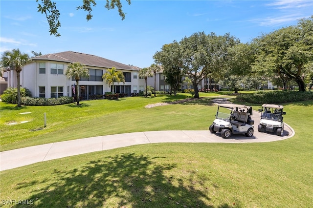 9380 Triana Ter Unit 312, Fort Myers, FL 33912 - view of property's community with a yard