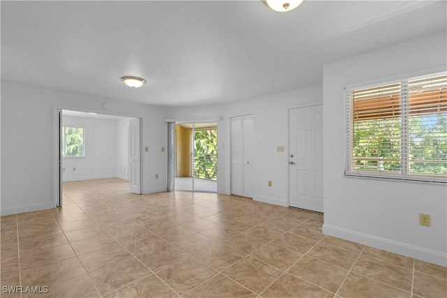 3160 Seasons Way Unit 709, Estero, FL 33928 - unfurnished room with light tile patterned flooring and baseboards