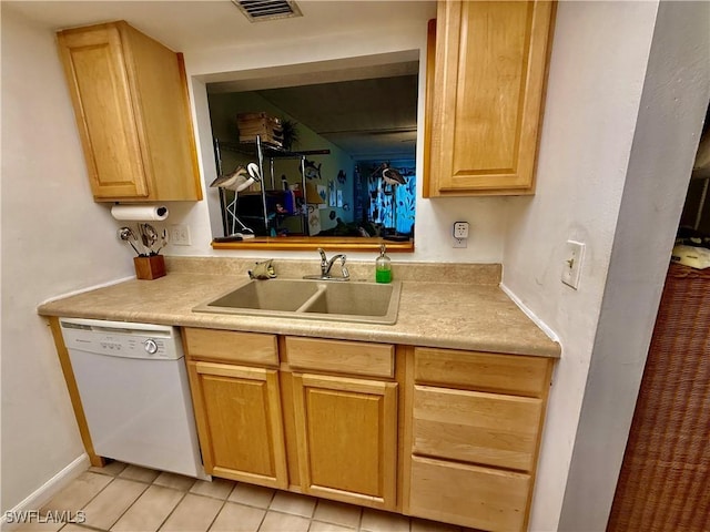 3706 Broadway Unit 18, Fort Myers, FL 33901 - kitchen featuring white dishwasher, a sink, light tile patterned floors, and light countertops