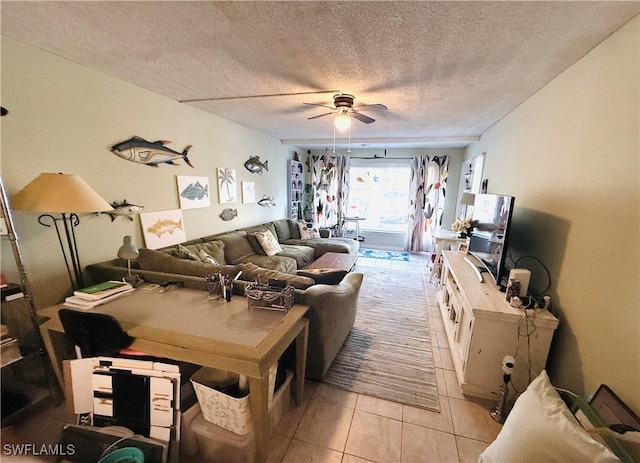 3706 Broadway Unit 18, Fort Myers, FL 33901 - living room with ceiling fan, light tile patterned floors, and a textured ceiling