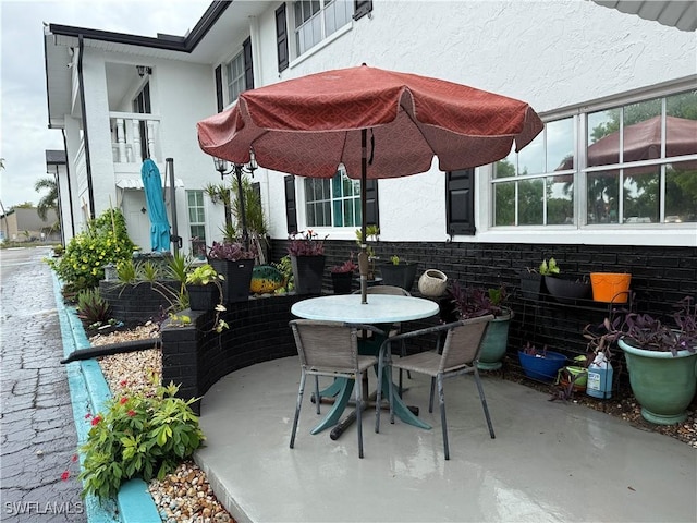 3706 Broadway Unit 18, Fort Myers, FL 33901 - view of patio featuring outdoor dining space