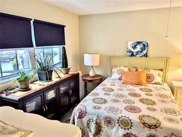 3706 Broadway Unit 18, Fort Myers, FL 33901 - bedroom featuring a textured ceiling