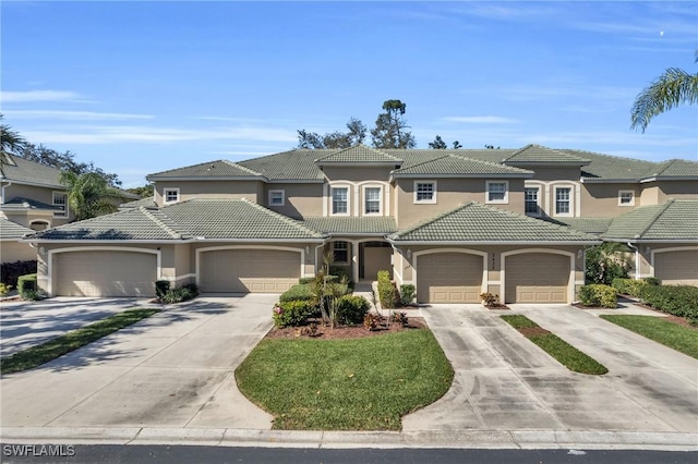 3435 Laurel Greens Ln S Unit 202, Naples, FL 34119 - mediterranean / spanish-style house with stucco siding, driveway, and a tile roof