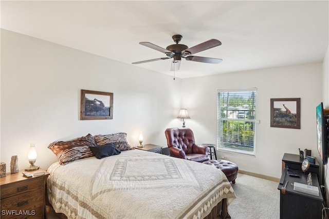 bedroom with carpet floors, baseboards, and ceiling fan