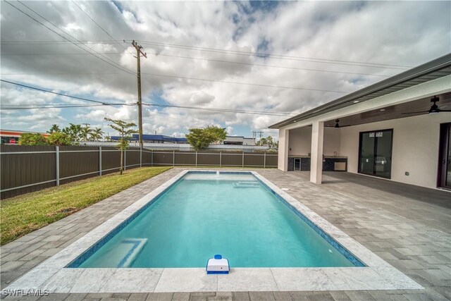 710 SW 25th Ln, Cape Coral, FL 33914 - view of swimming pool with a fenced backyard, a patio area, and ceiling fan